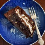 A decadent slice of classic Mississippi Mud Pie, gooey, nutty, and irresistible.